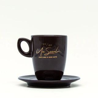 Tazza Filicori Zecchini | Mug Celebrazione Centenario, elegante in porcellana, per gustare il tuo caffè con stile.