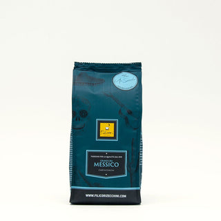 Chicchi di caffè Grand Cru Messico di Filicori, con note seducenti di arance per un'esperienza unica.