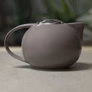 Teiera Zoe in porcellana, unisci eleganza e funzionalità per la tua pausa tè con stile.